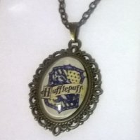 Медальон Harry Potter Hufflepuff 4х3 см.